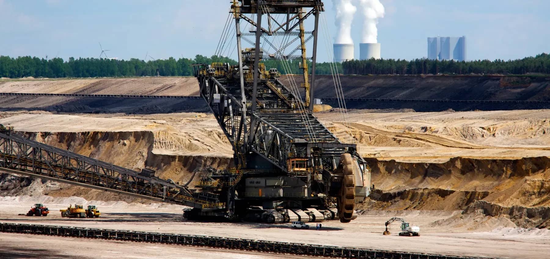Blockchain and the family office, a giant bucket-wheel excavator working an open-cast mine.