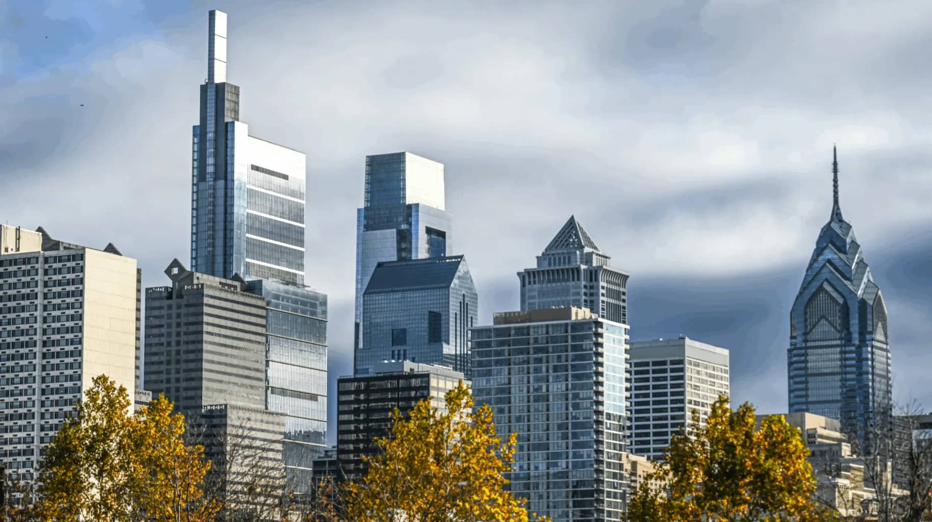 US law change for LLCs, the Philadelphia skyline beneath a pale sky.