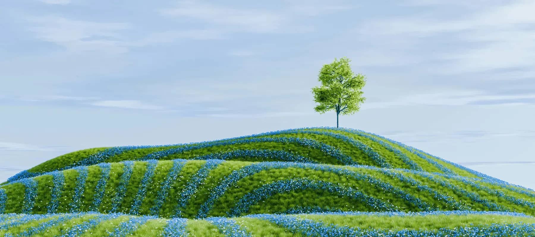 Philanthropy 3.0, a single tree standing on a green hillside scattered with blue flowers.