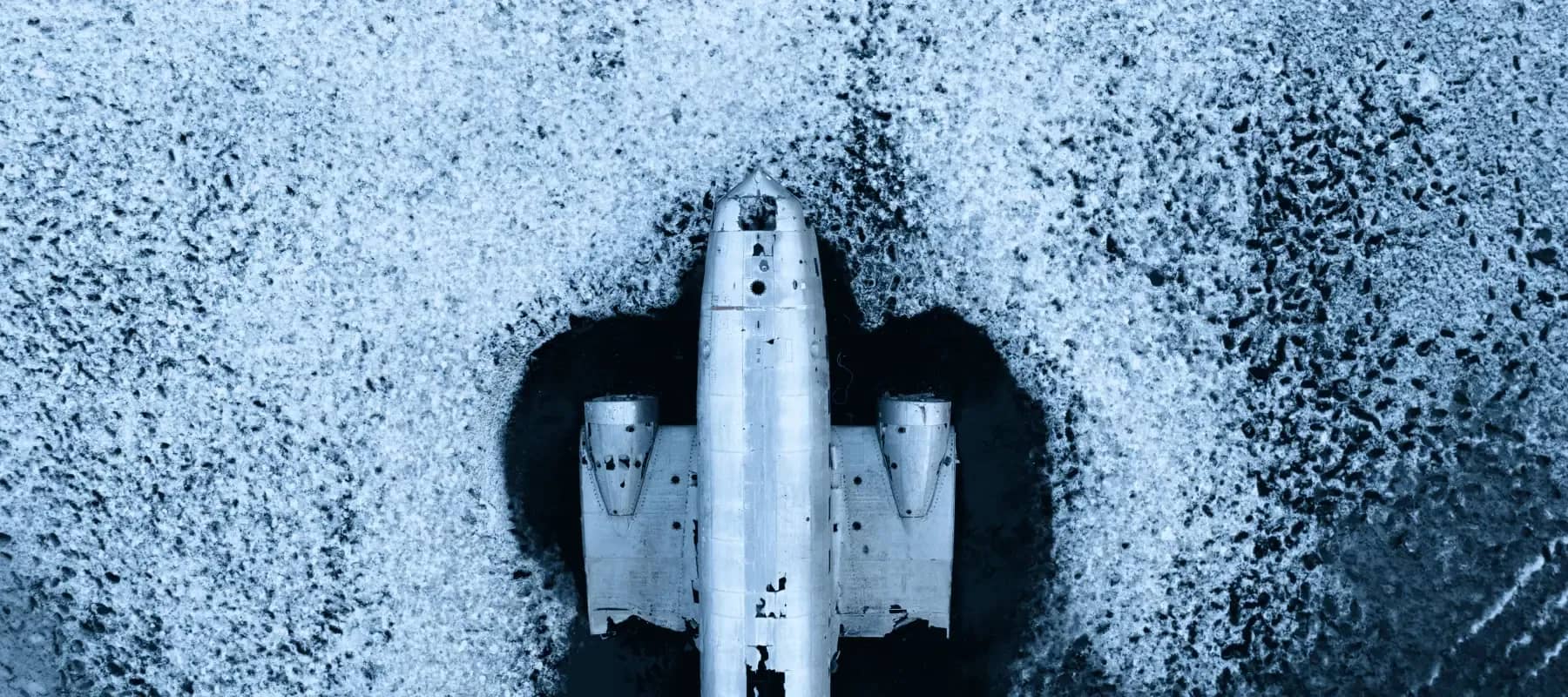 Family offices and defencetech, an aerial view of a spacecraft on textured ground.