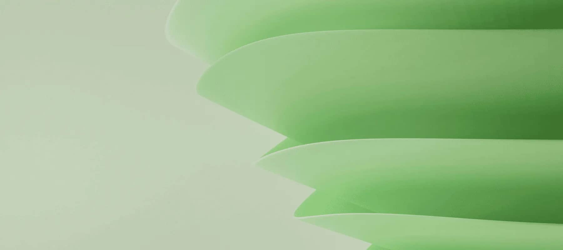 Power BI reporting, smooth green folded surfaces curving across the frame.