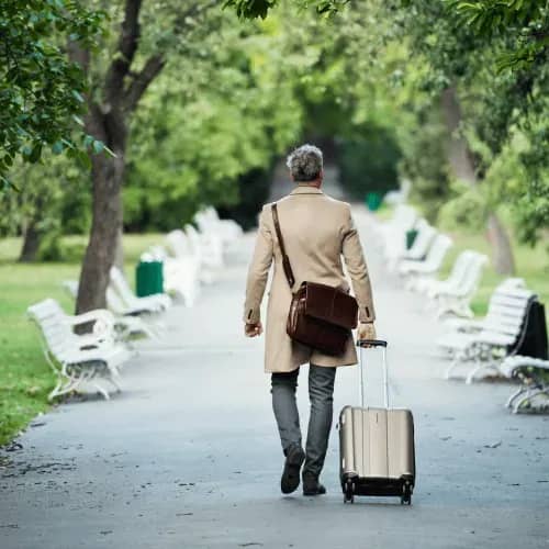 Family office principal travelling internationally, illustrating tax residency and global mobility risks