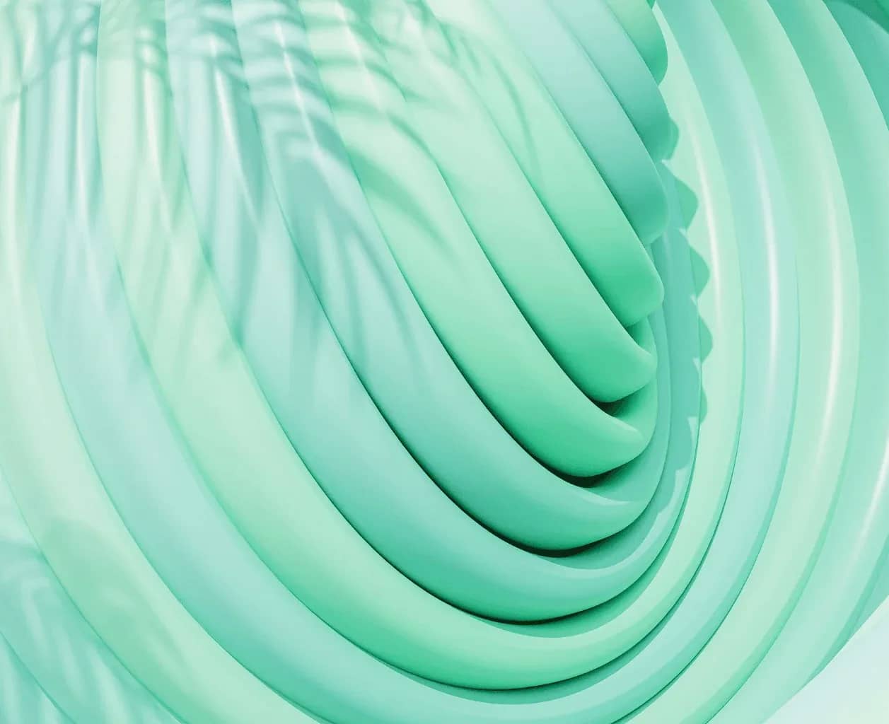 Family office health and wellness, coiled ribbons of mint green forming a soft spiral.