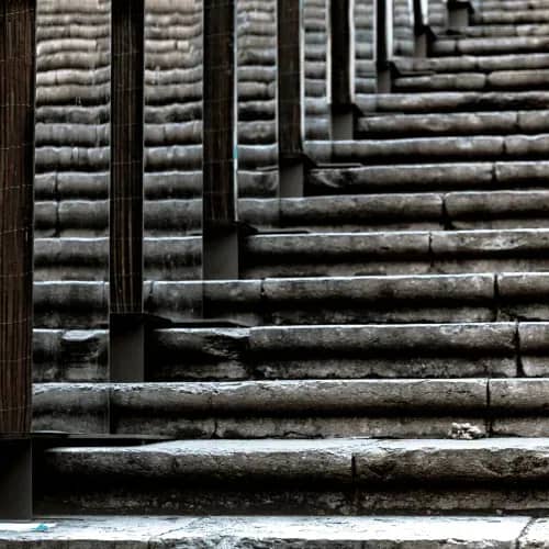 Stone steps forming a structured path, representing a disciplined and phased approach to building an AI strategy for a single-family office
