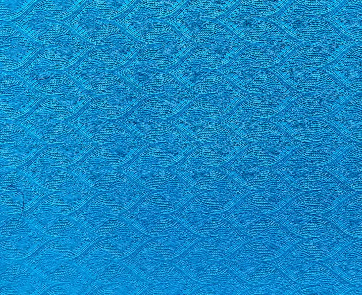 Replacing Excel in wealth management, a woven blue surface of interlocking cable-knit lines.