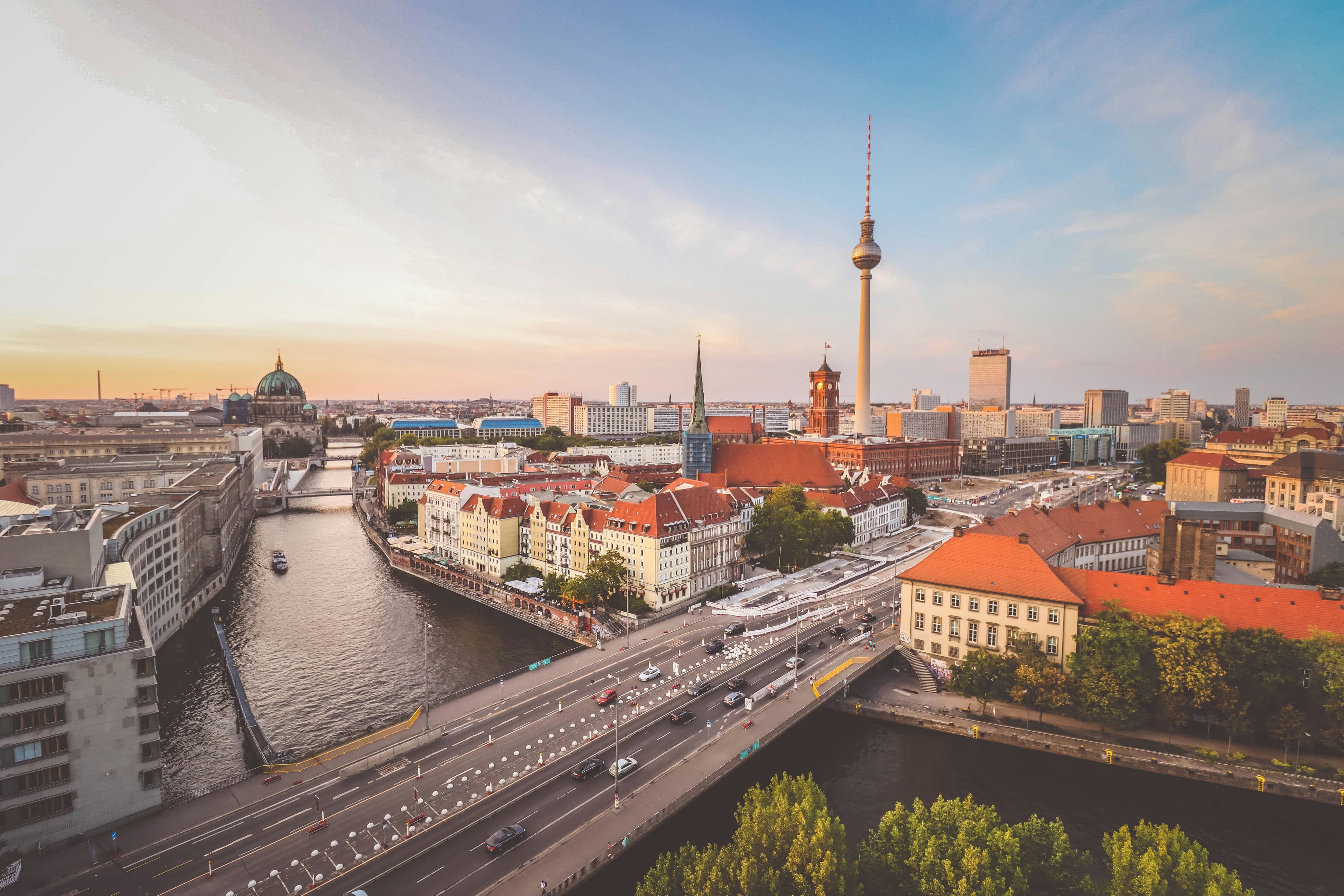 Berlin skyline with TV Tower at sunset over the Spree river, DACH family office hub