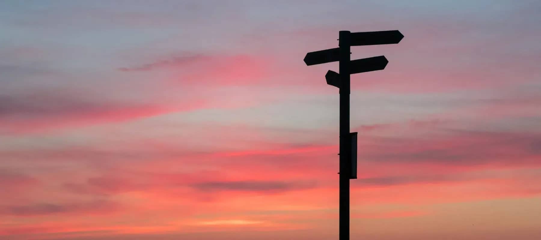 Do you need a family office, a signpost silhouetted against a red evening sky.