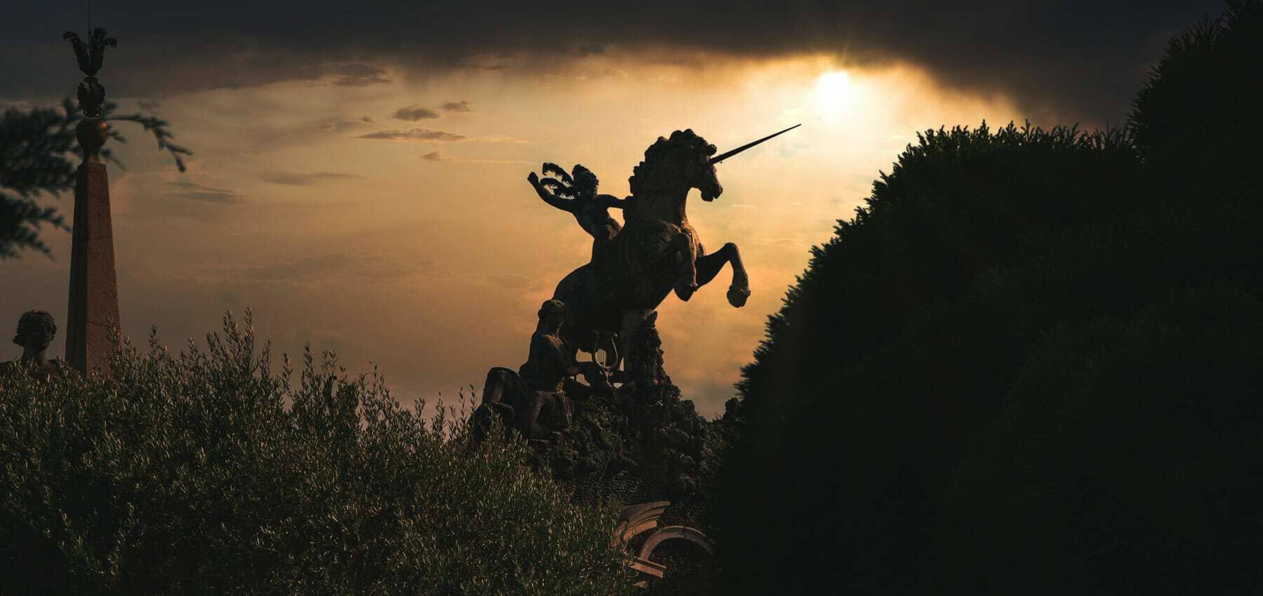 Late-stage venture investing, a bronze statue of a rearing horse against a hazy sunset.