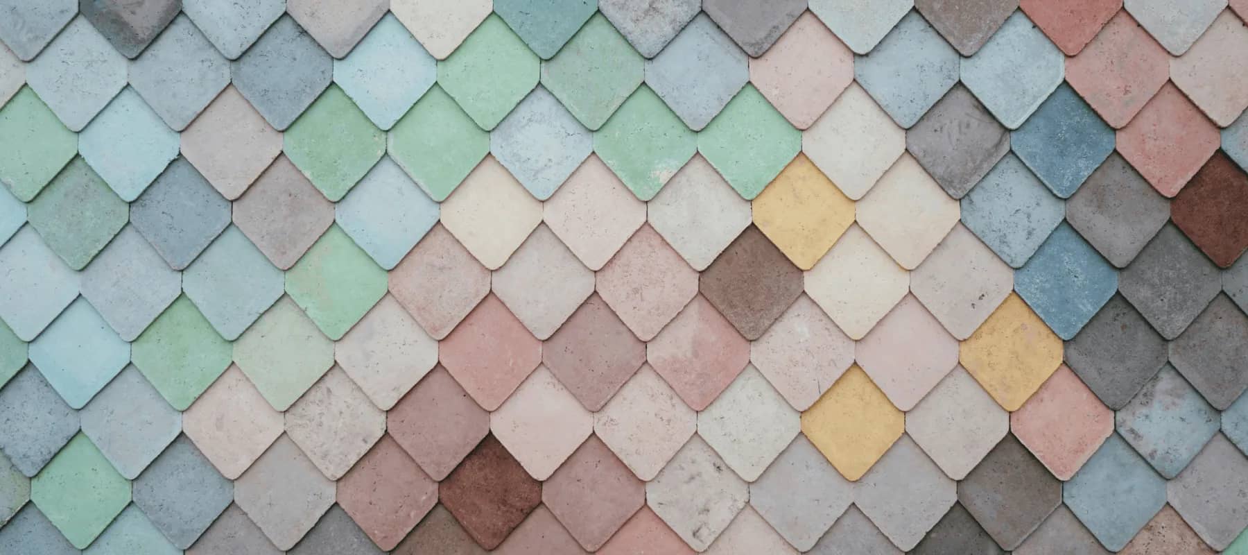 Health insurance considerations, pastel scalloped tiles in overlapping rows.