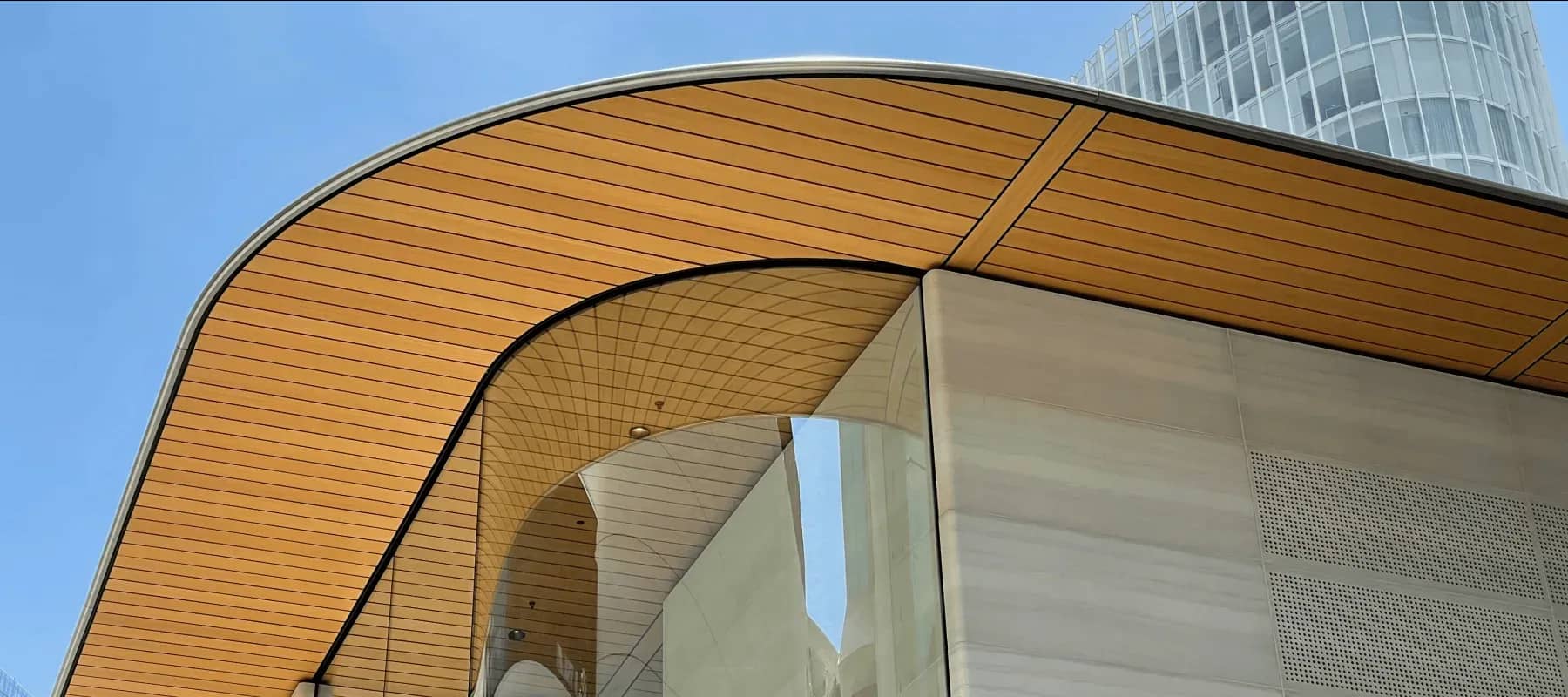 LegalTech for family offices, a curved golden roof sweeping against a blue sky.