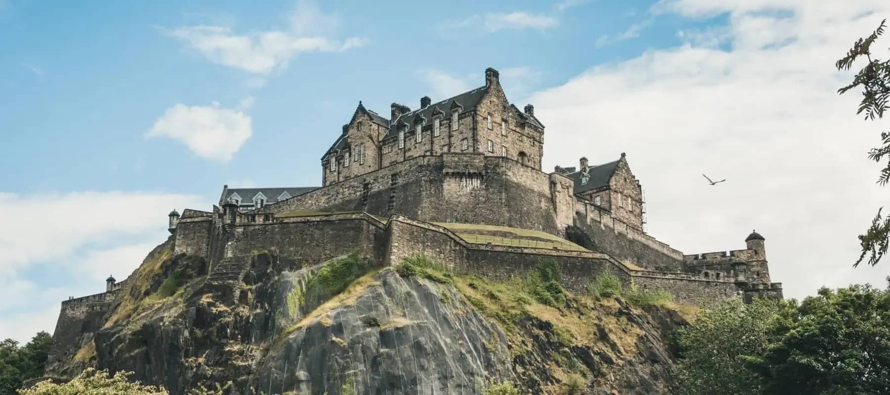 European family offices, a castle standing on a rocky crag above the city.