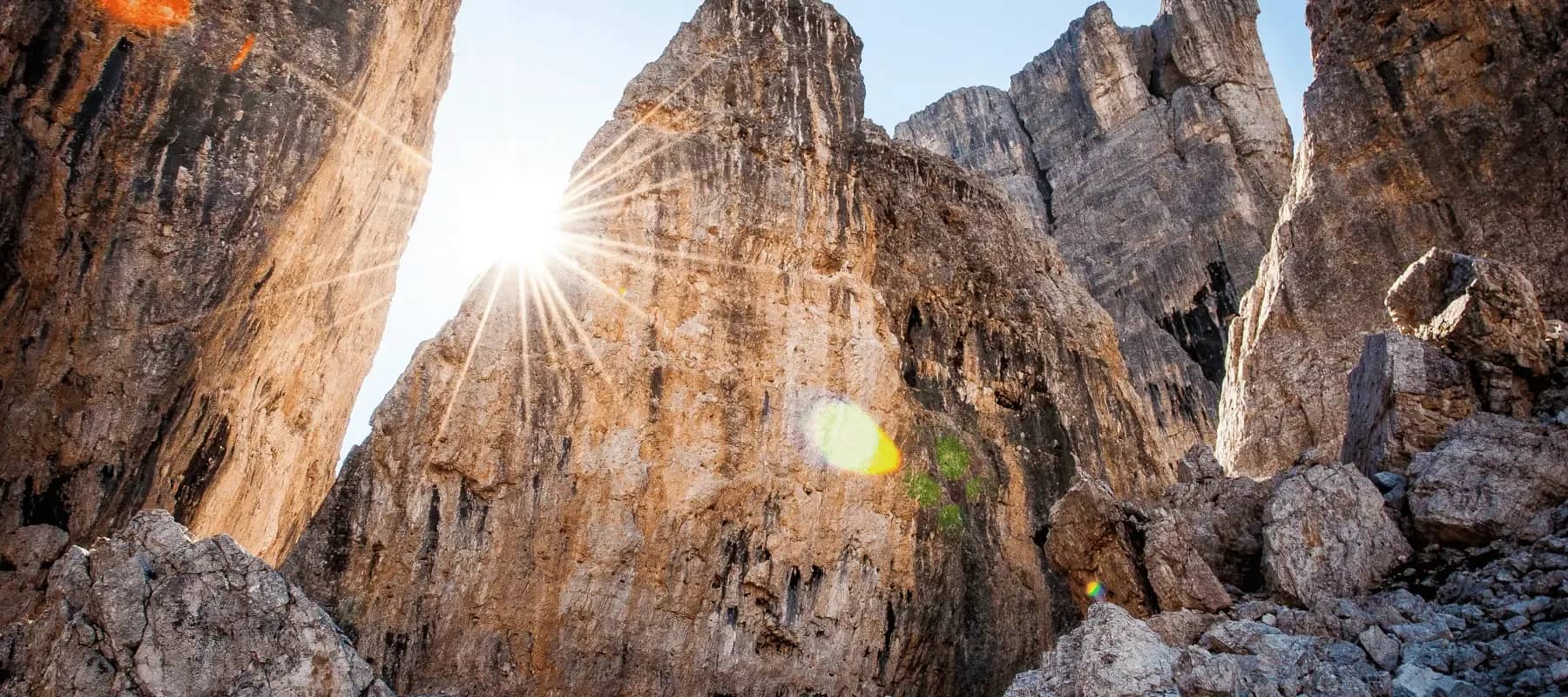 Bridging the venture capital knowledge gap, sunlight bursting through a narrow rock gorge.