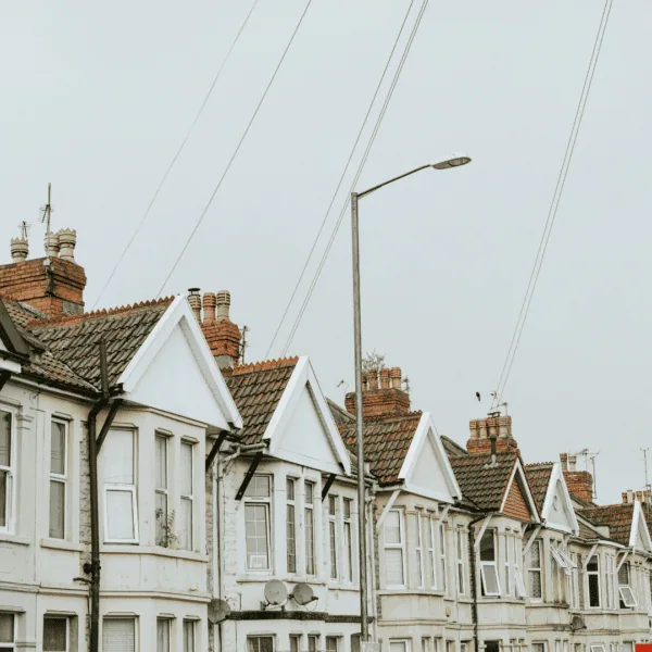 A row of traditional UK terraced houses representing multi-generational property inheritance and portfolio restructuring