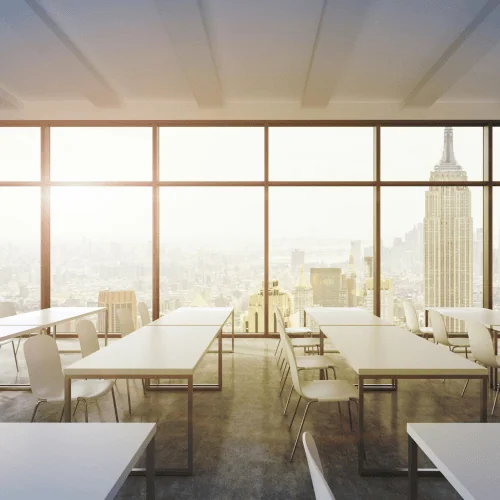 Boardroom overlooking city skyline, representing family offices assessing AI startup investments